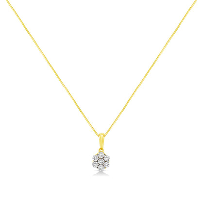Front-facing view of a yellow metal necklace with a pendant featuring seven round white gemstones in a clustered prong setting.