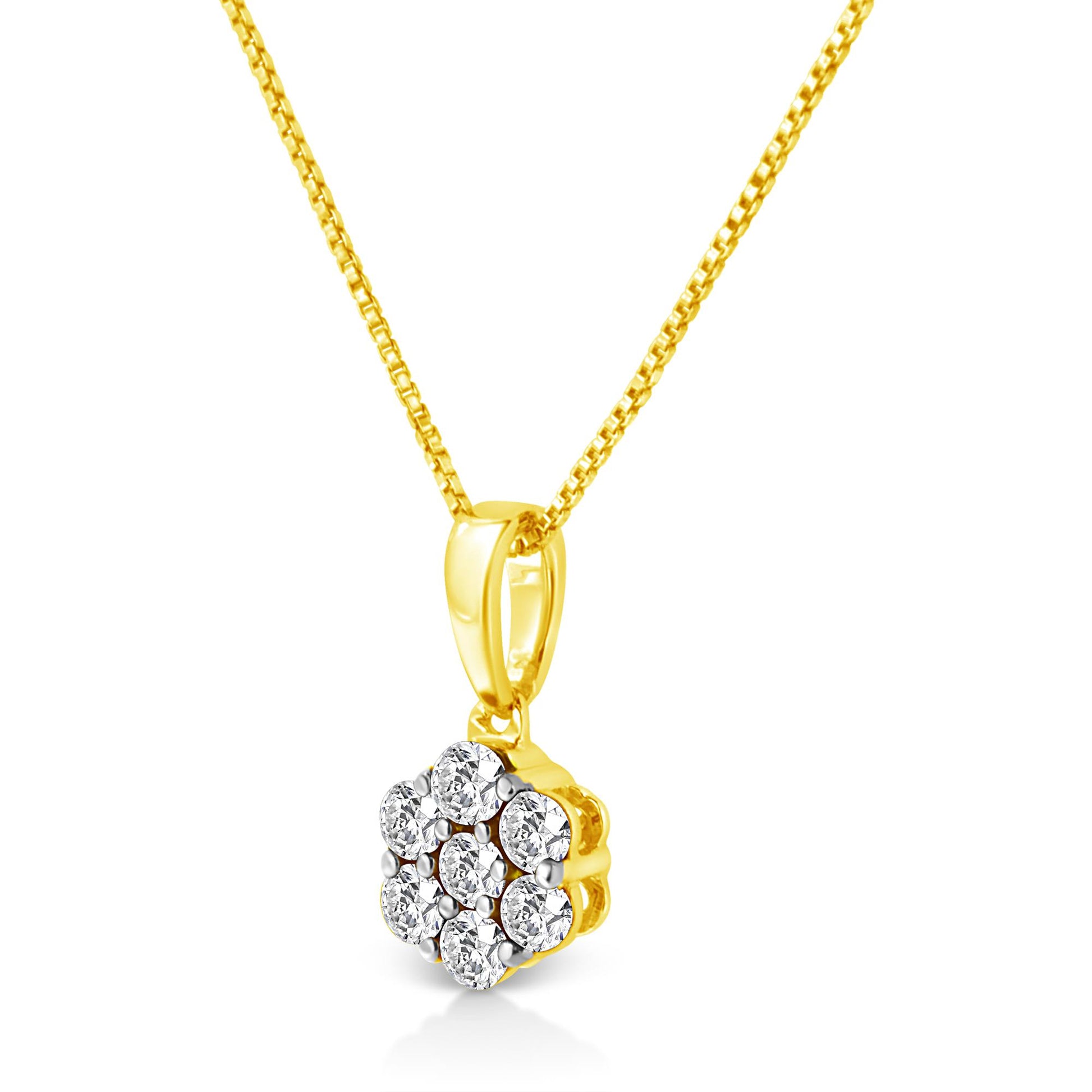 Front angled view of a yellow necklace with a pendant featuring seven round white gemstones in a prong setting.