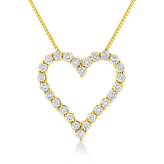 Front-facing close-up of a yellow metal heart-shaped necklace pendant set with round white gemstones in prong settings.