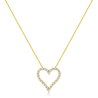 Front view of a yellow metal necklace with an open heart-shaped pendant outlined with round prong-set brownish gemstones.