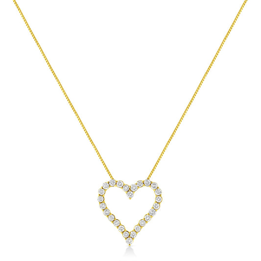 Front view of a yellow metal necklace with an open heart-shaped pendant outlined with round prong-set brownish gemstones.