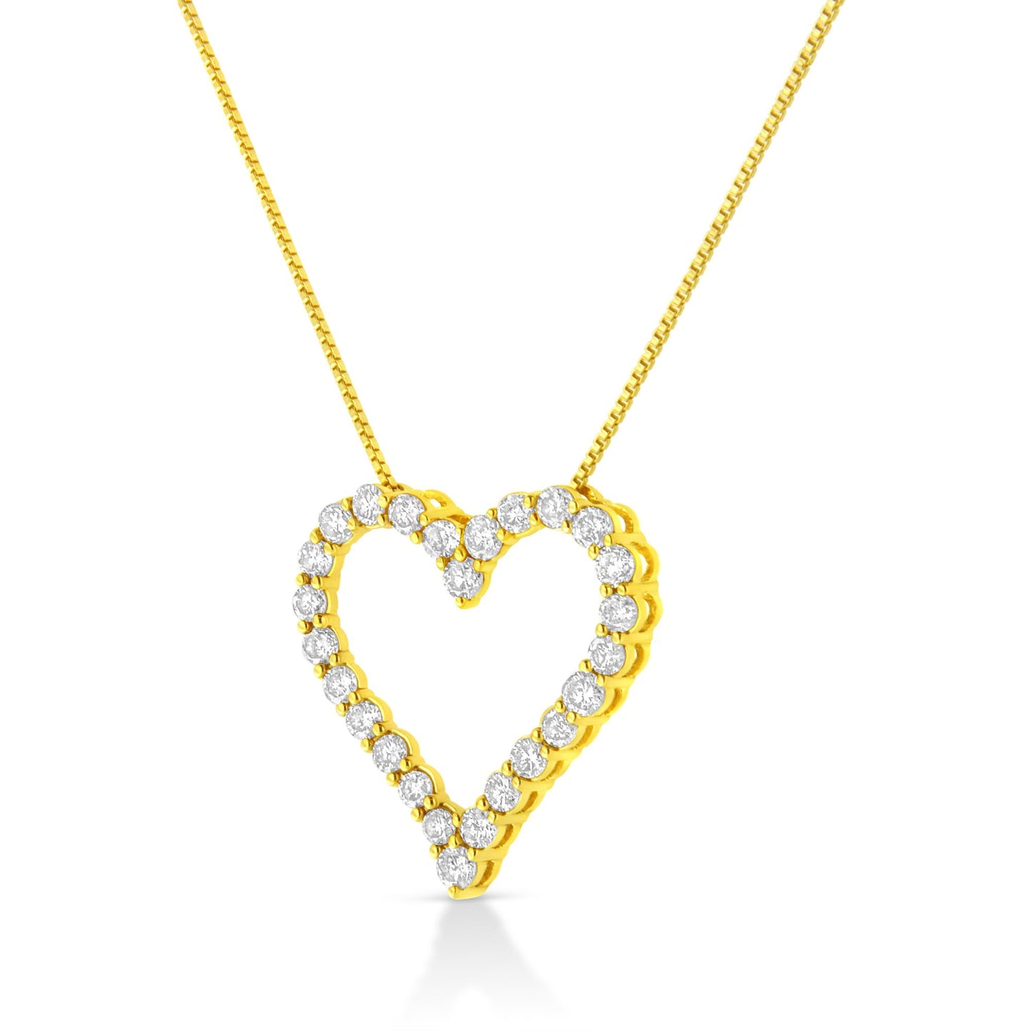 Front-angle view of a yellow metal heart-shaped necklace pendant outlined with round prong-set white gemstones, hanging from a matching yellow chain.