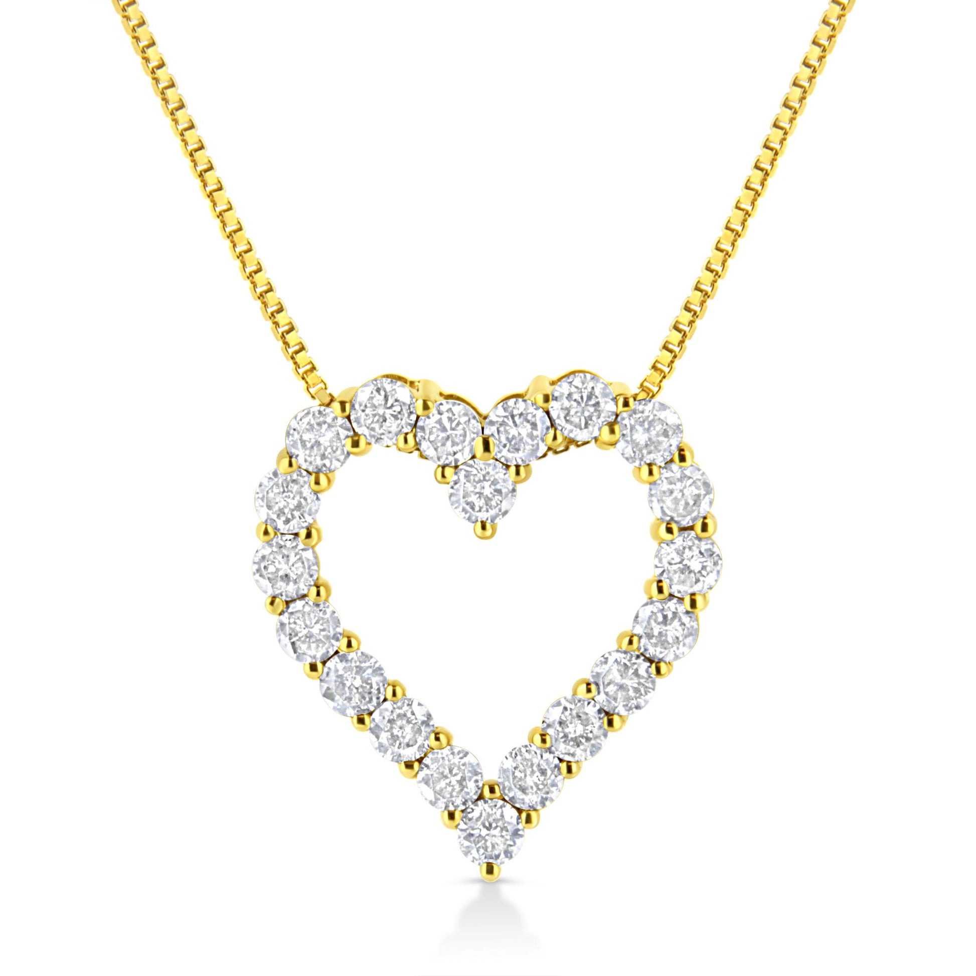 Front view of a yellow necklace with a heart-shaped pendant composed of round, prong-set white gemstones.