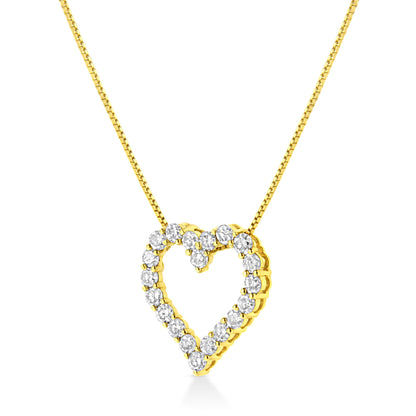 Yellow metal necklace with a heart-shaped pendant set with round white gemstones in a prong setting, shown at a front angle.
