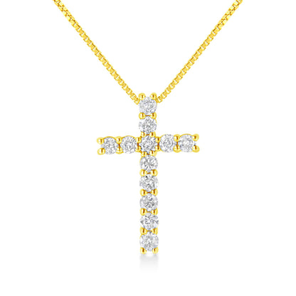 Front angle view of a yellow metal necklace with a cross-shaped pendant featuring round white gemstones in prong settings.