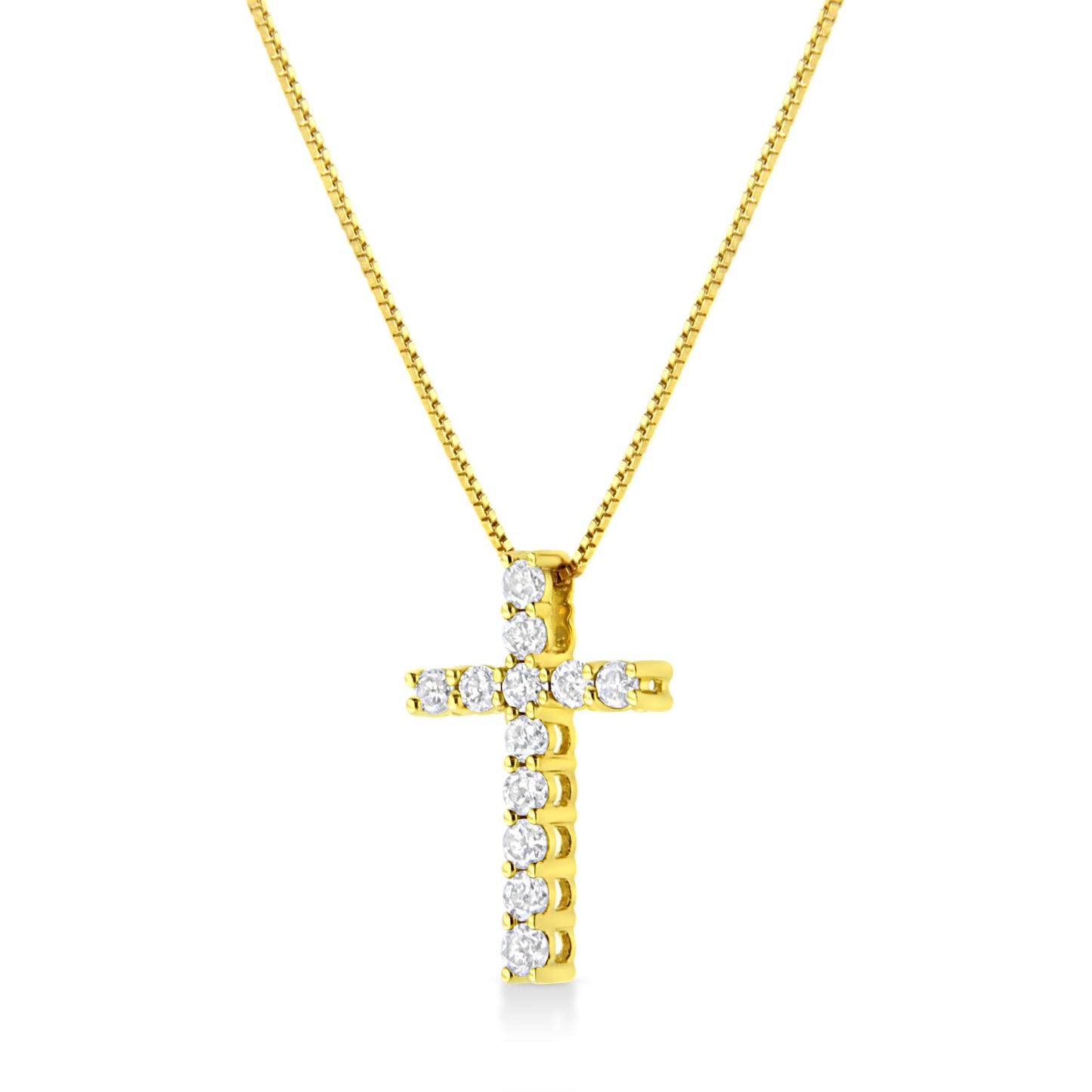 Front angle view of a yellow metal cross necklace with round white gemstones in prong settings.
