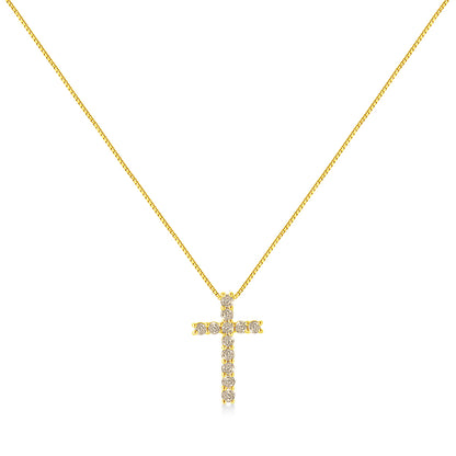 Front-facing image of a yellow metal necklace with a cross pendant adorned with round-shaped brownish prong-set gemstones.