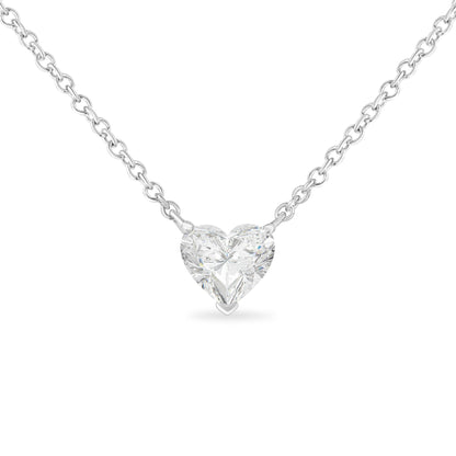 Front view of a white metal necklace with a heart-shaped white gemstone in prong setting.