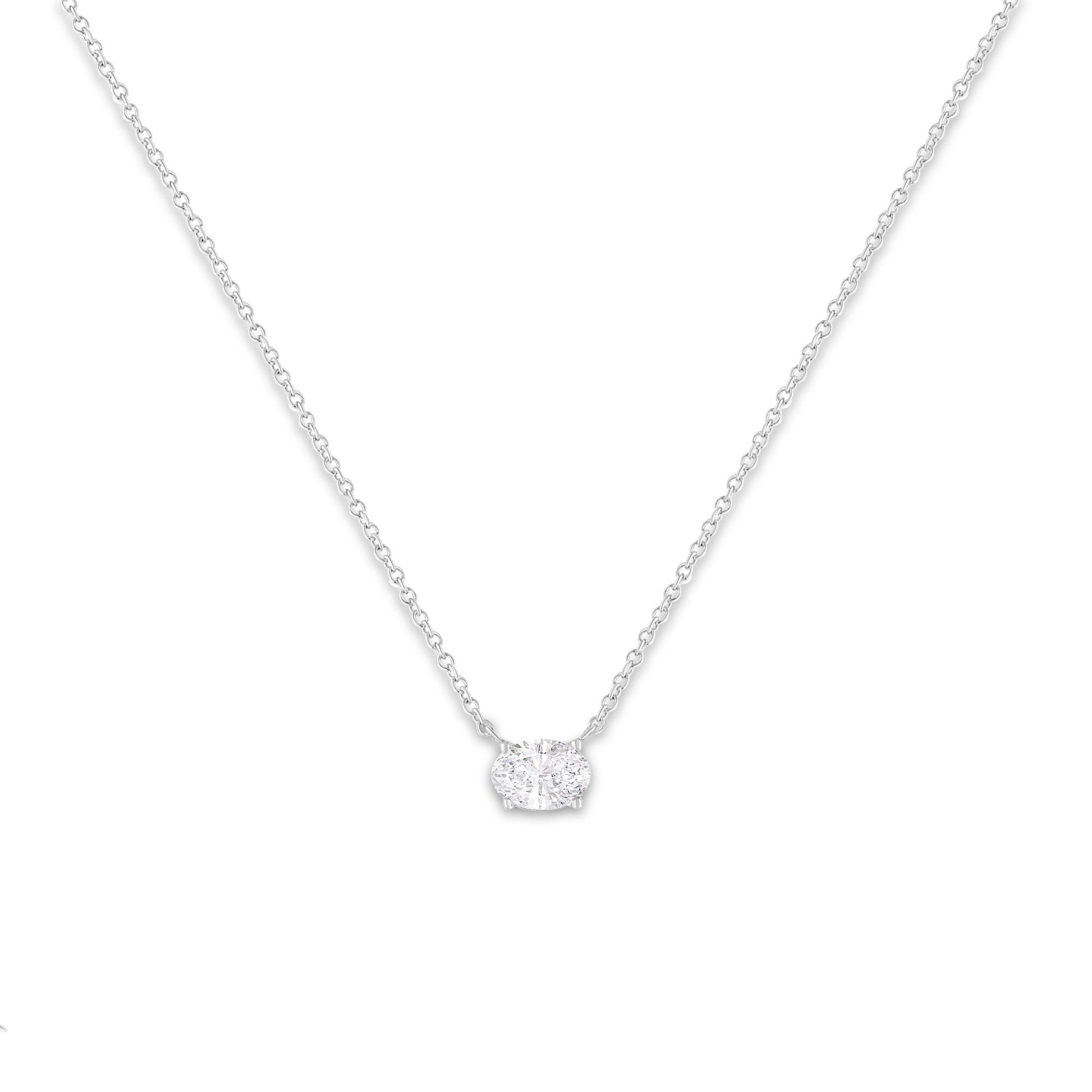 White metal necklace with an oval-shaped white gemstone in a 4-prong setting, shown from a front angle on a white background.