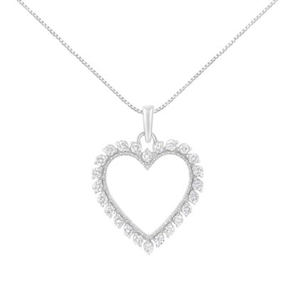 Front angle of white necklace with heart-shaped pendant featuring round white gemstones set in prongs around the heart outline.