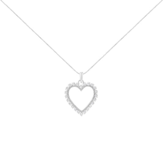 Front angle view of a white metal heart-shaped necklace pendant with round white gemstones in a prong setting, hanging on a chain.