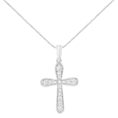 Front view of white metal cross-shaped necklace pendant adorned with multiple round white gemstones in prong settings on a thin chain.