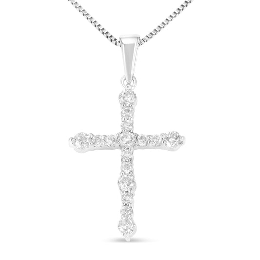 Front view of a white metal cross necklace pendant with round white gemstones in prong settings along the vertical and horizontal bars.