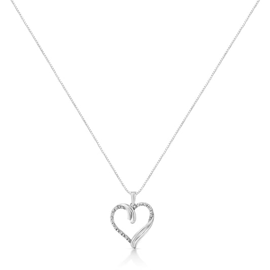 Front view of a white metal heart-shaped necklace pendant with round prong-set white gemstones along the left and bottom right side, hanging from a thin chain.