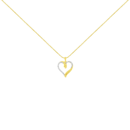 Front-facing shot of a yellow metal heart-shaped necklace pendant with white round gemstones in prong settings on part of the heart outline.
