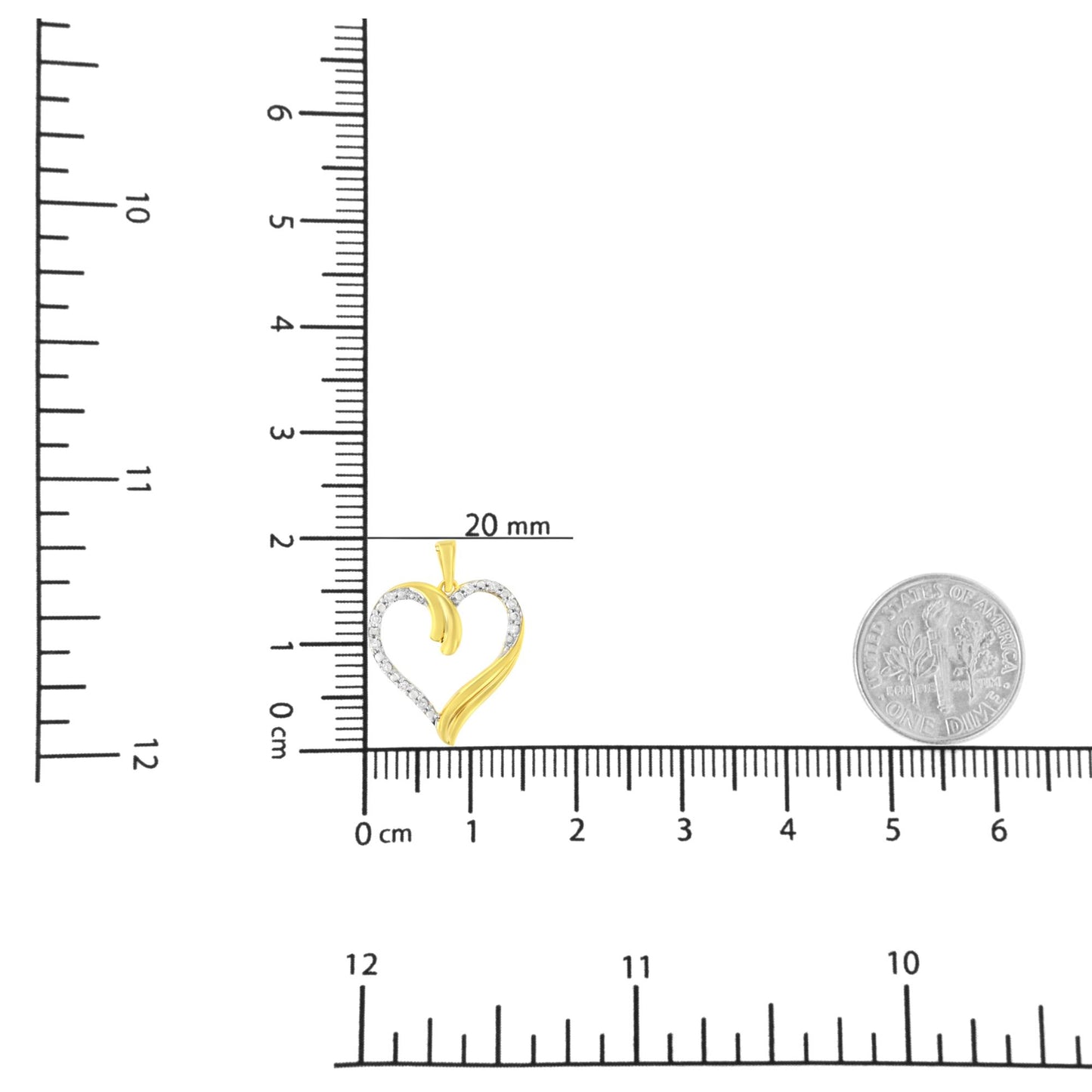 Yellow heart-shaped necklace pendant with white round gemstones in prong setting, shown on ruler and scale for size reference, front angle.