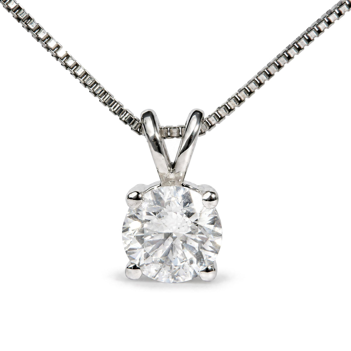 Close-up front view of a white metal necklace with a round white gemstone in a 4-prong setting.