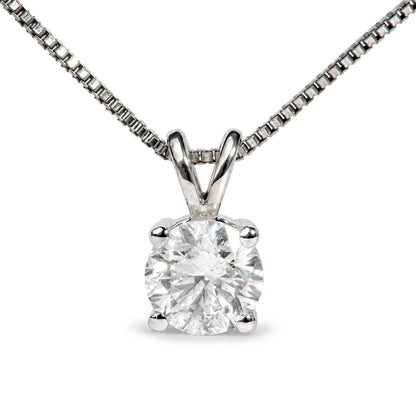 Close-up front view of a white metal necklace with a round white gemstone in a 4-prong setting.