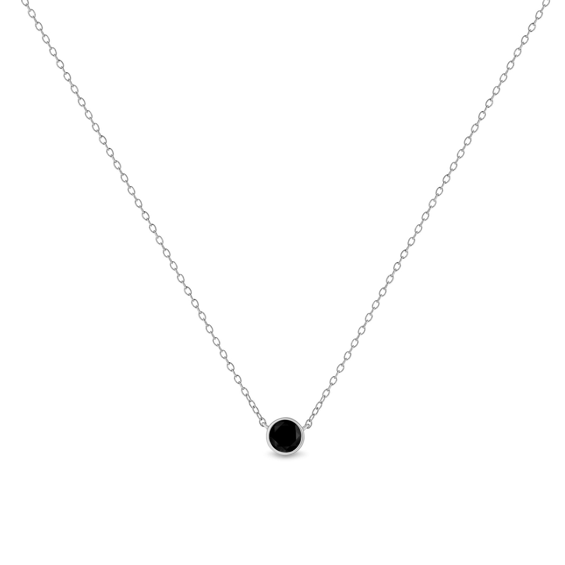 Front view of a white metal necklace with a single round black gemstone in bezel setting pendant.