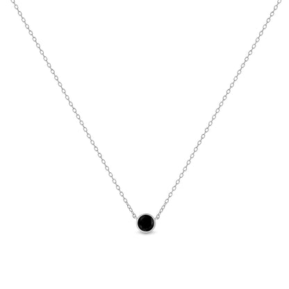 Front view of a white metal necklace with a single round black gemstone in bezel setting pendant.