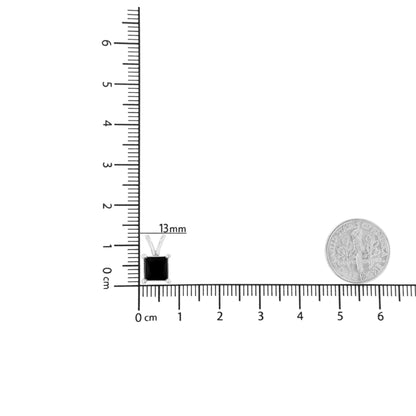 White metal necklace with a princess-shaped black gemstone pendant in prong setting, shown on a ruler and next to a coin for size reference, top-down angle.