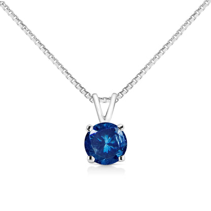 Close-up front view of a white metal necklace with a pendant featuring a round blue gemstone in a prong setting.