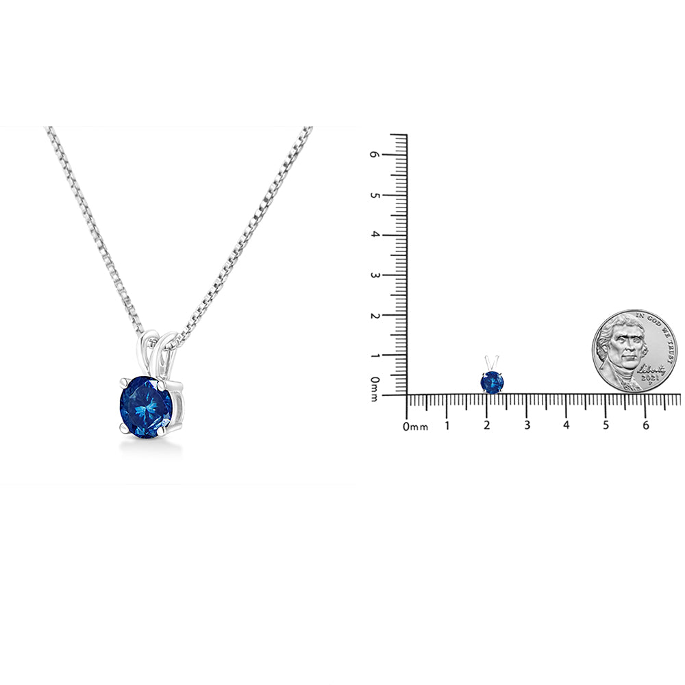 White metal necklace with a round blue gemstone pendant in a prong setting, front angle; second image shows the pendant alone on a ruler and next to a coin for size reference.