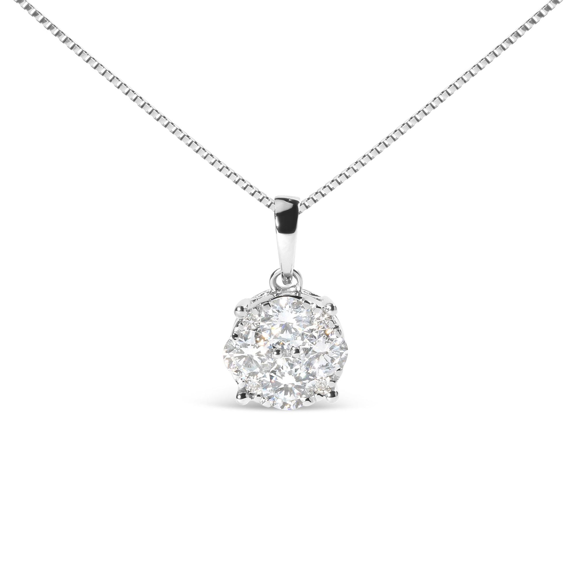 Front view of a white metal necklace with a pendant featuring a cluster of round white gemstones in prong settings.