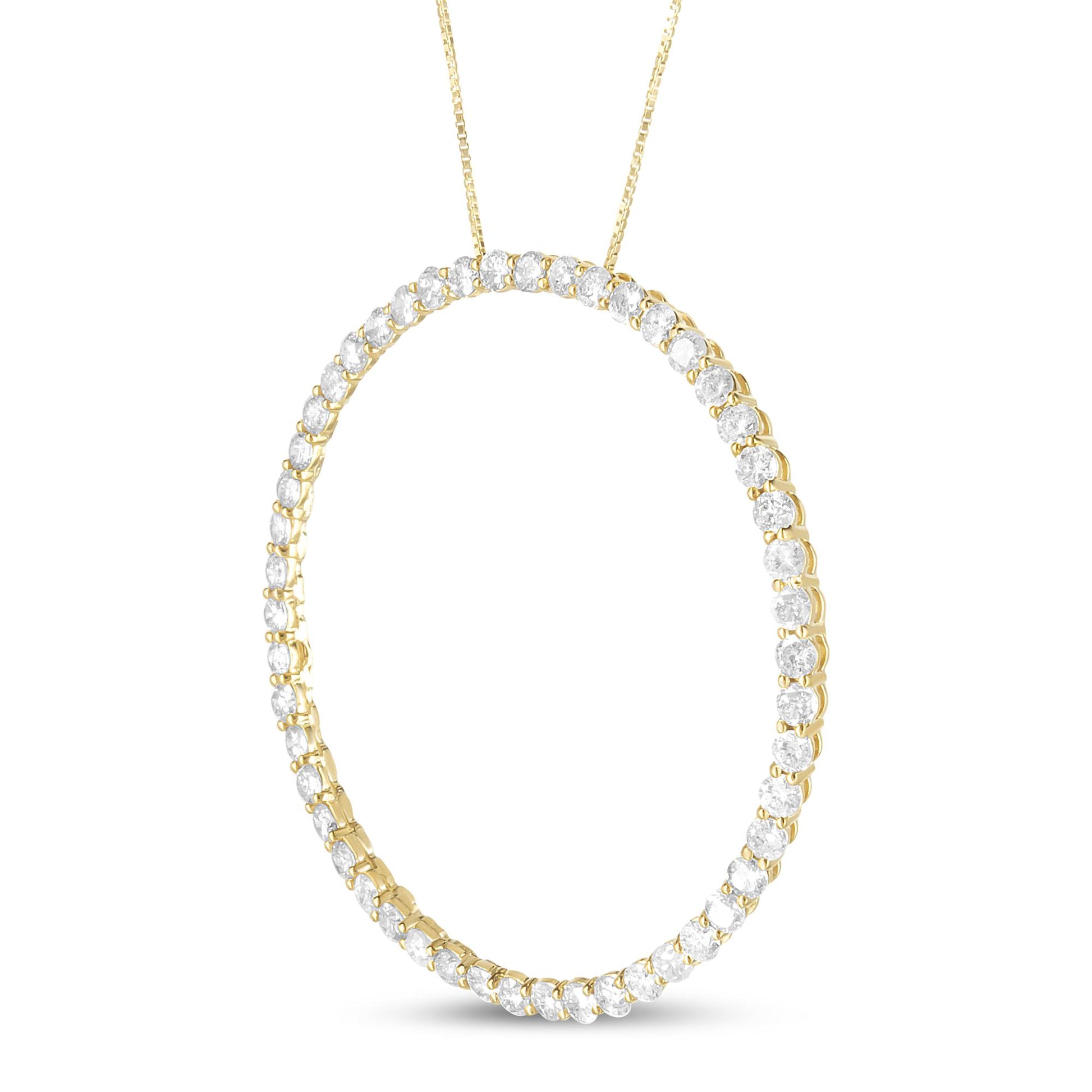 Yellow metal necklace with an oval-shaped pendant set with round white gemstones in prong settings, shown in a front-facing close-up angle.