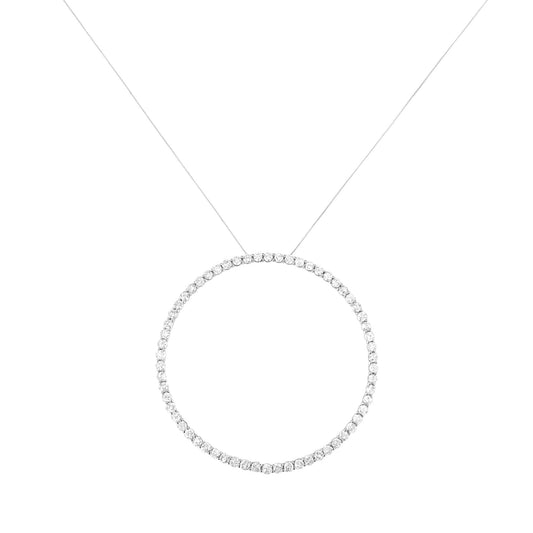 Front-facing shot of a white metal necklace featuring a circular pendant adorned with round white gemstones in prong settings.