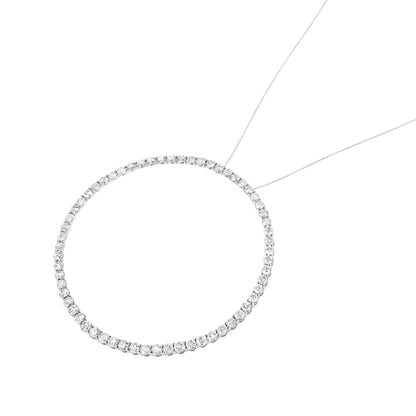 Close-up front angle of a white metal necklace featuring a circular pendant adorned with round white gemstones in a prong setting.