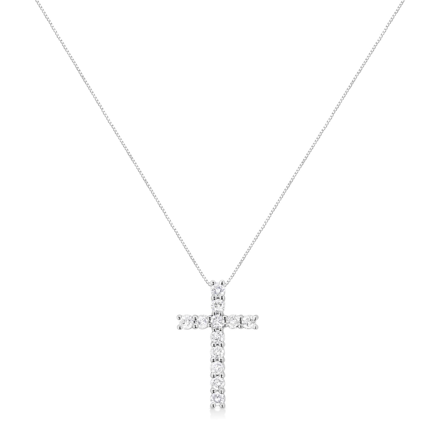 Front view of a white metal necklace with a cross pendant featuring round white gemstones in prong settings.