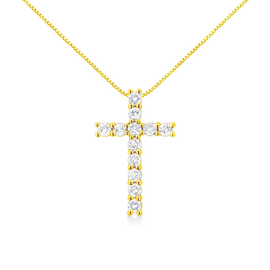 Front view of a yellow metal necklace with a cross pendant featuring round white gemstones in prong settings.