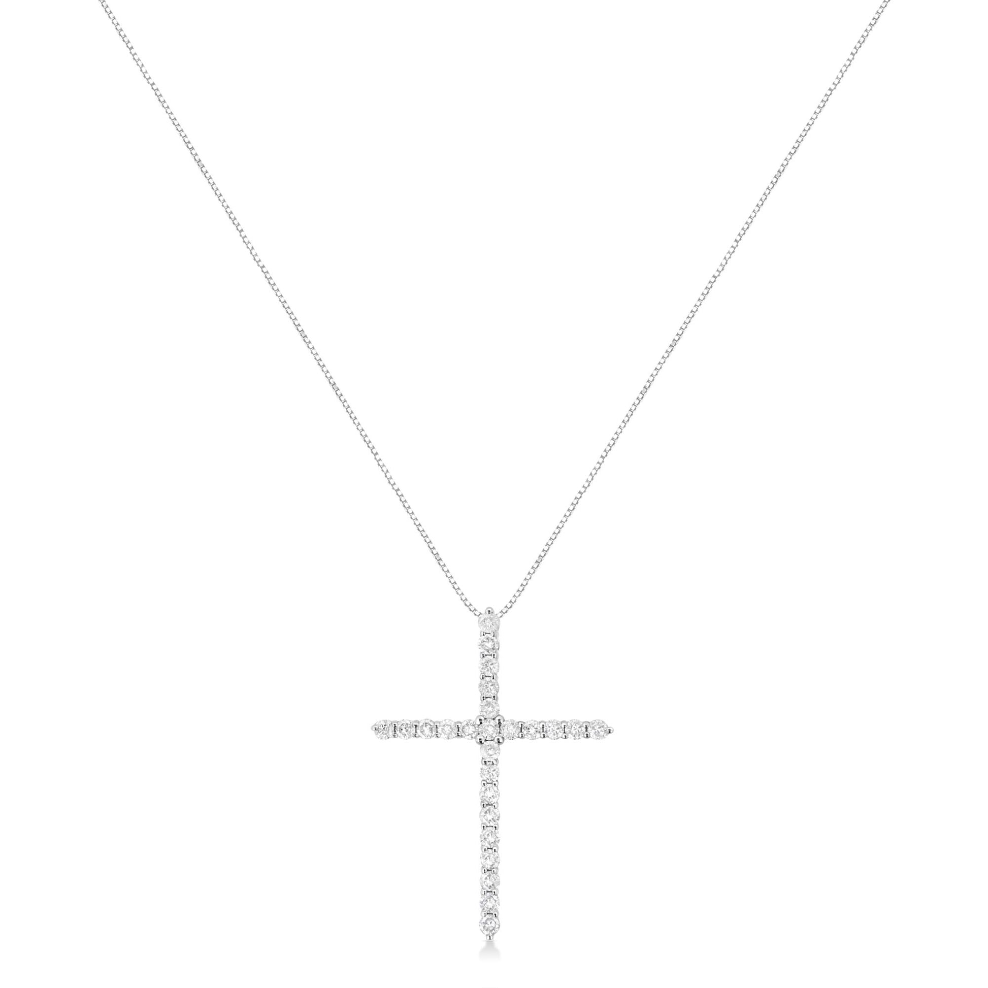 Front view of a white necklace with a cross-shaped pendant featuring round white gemstones in prong settings.
