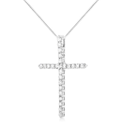 Front view of a white metal cross-shaped necklace pendant with round white gemstones in prong settings.