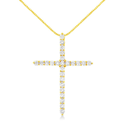 Front view of a yellow metal cross necklace pendant with round white gemstones in prong settings.