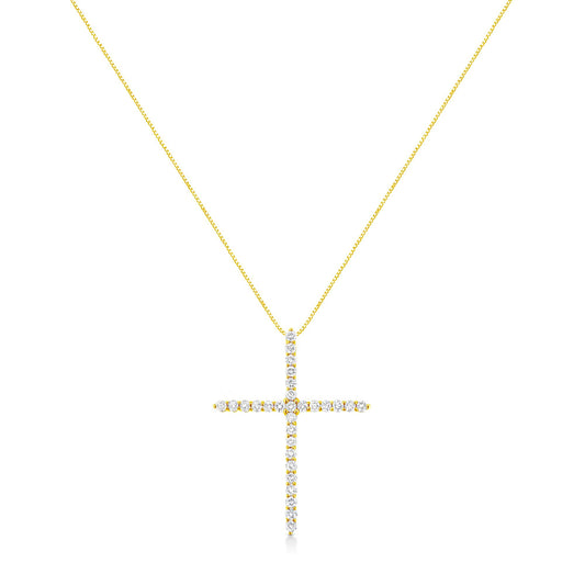 Front view of a yellow metal necklace with a cross-shaped pendant adorned with round white gemstones in prong settings.