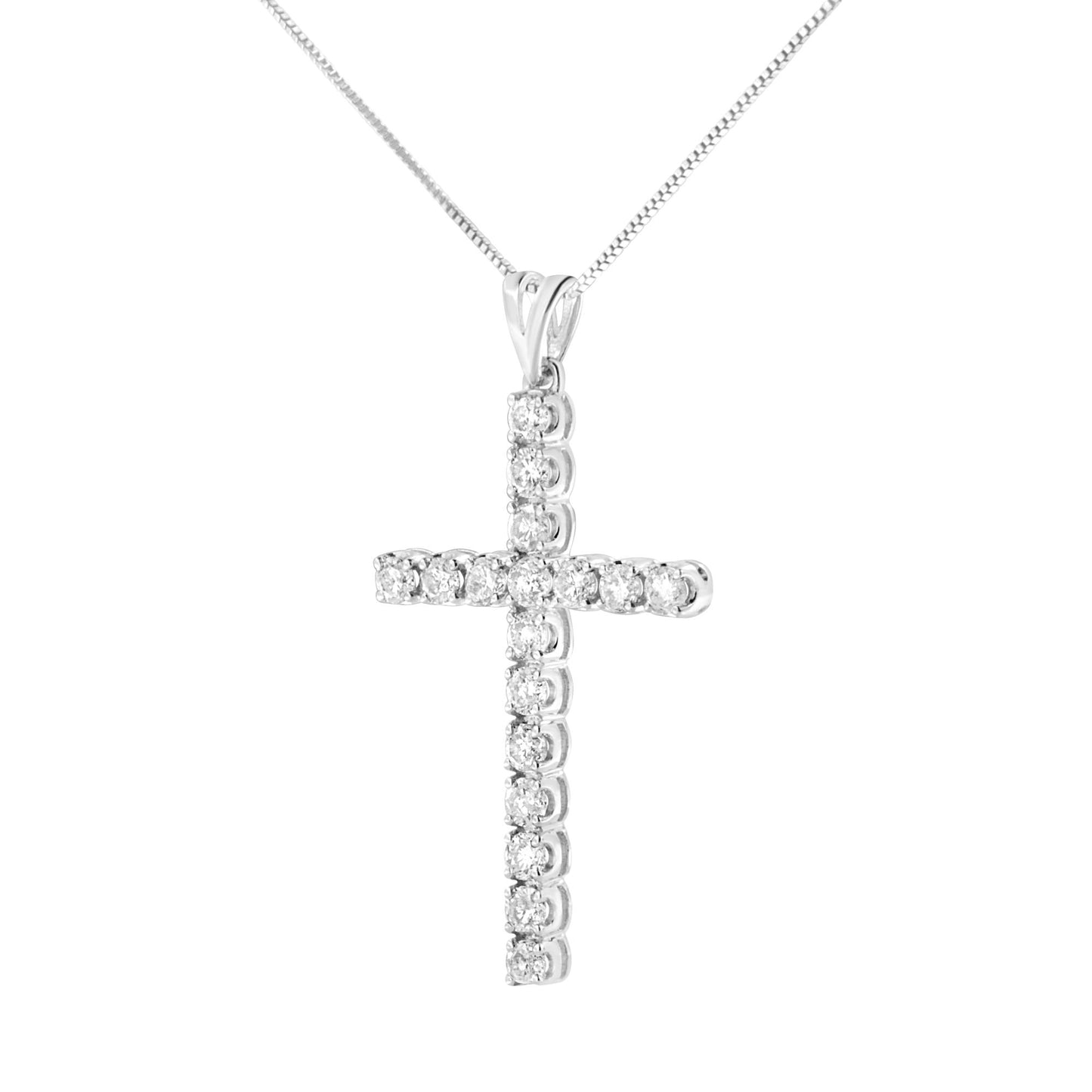 Front angle view of a white metal necklace with a cross pendant set with round white gemstones in prong settings.