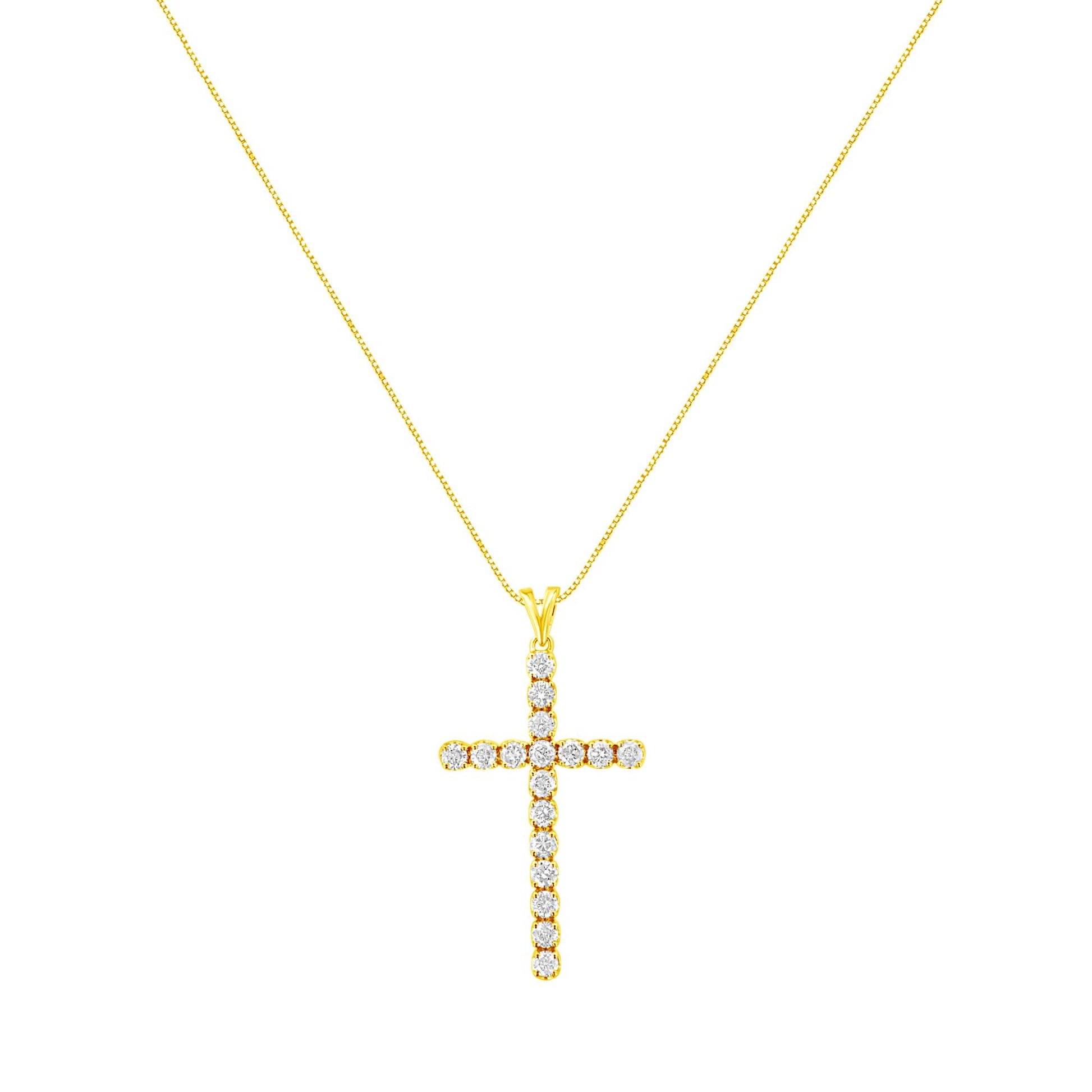 Front view of a yellow metal necklace with a cross-shaped pendant featuring round white gemstones in prong settings.