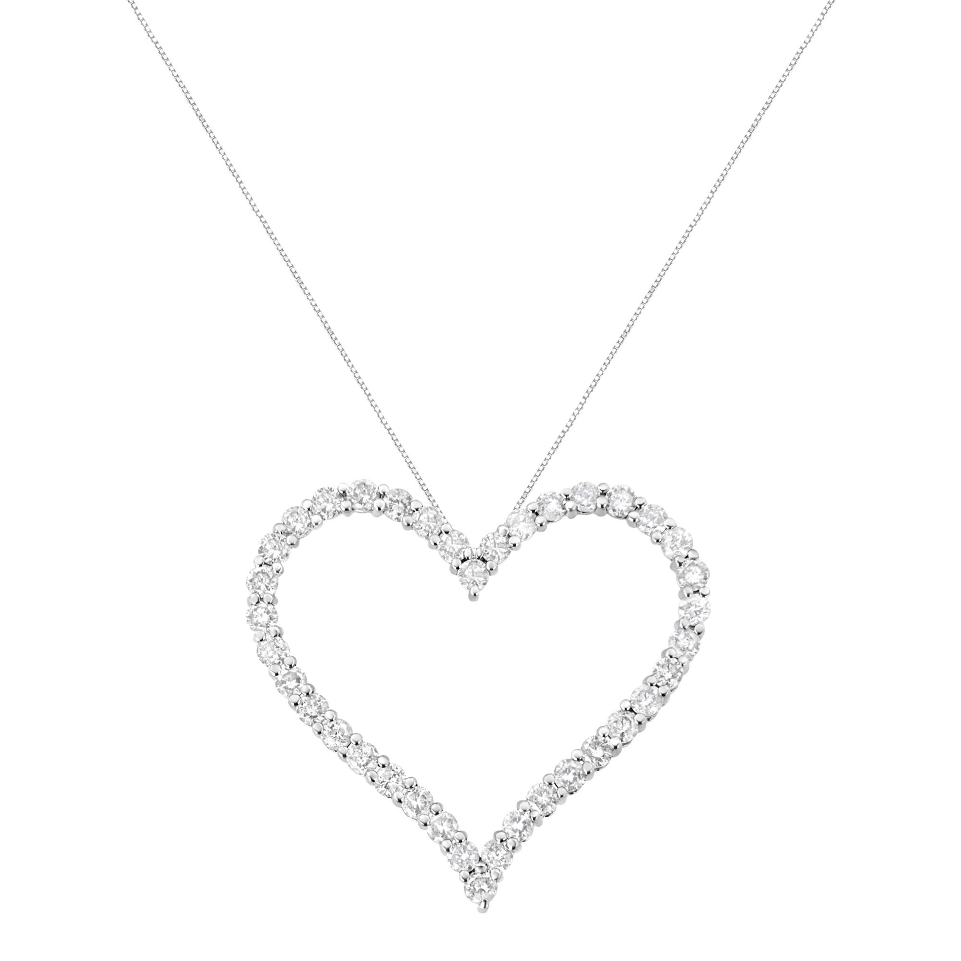 Front view of a white metal heart-shaped necklace pendant outlined with round white gemstones in prong settings on a fine chain.
