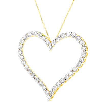 Front-facing close-up of a yellow metal heart-shaped necklace pendant outlined with round white gemstones in prong settings.