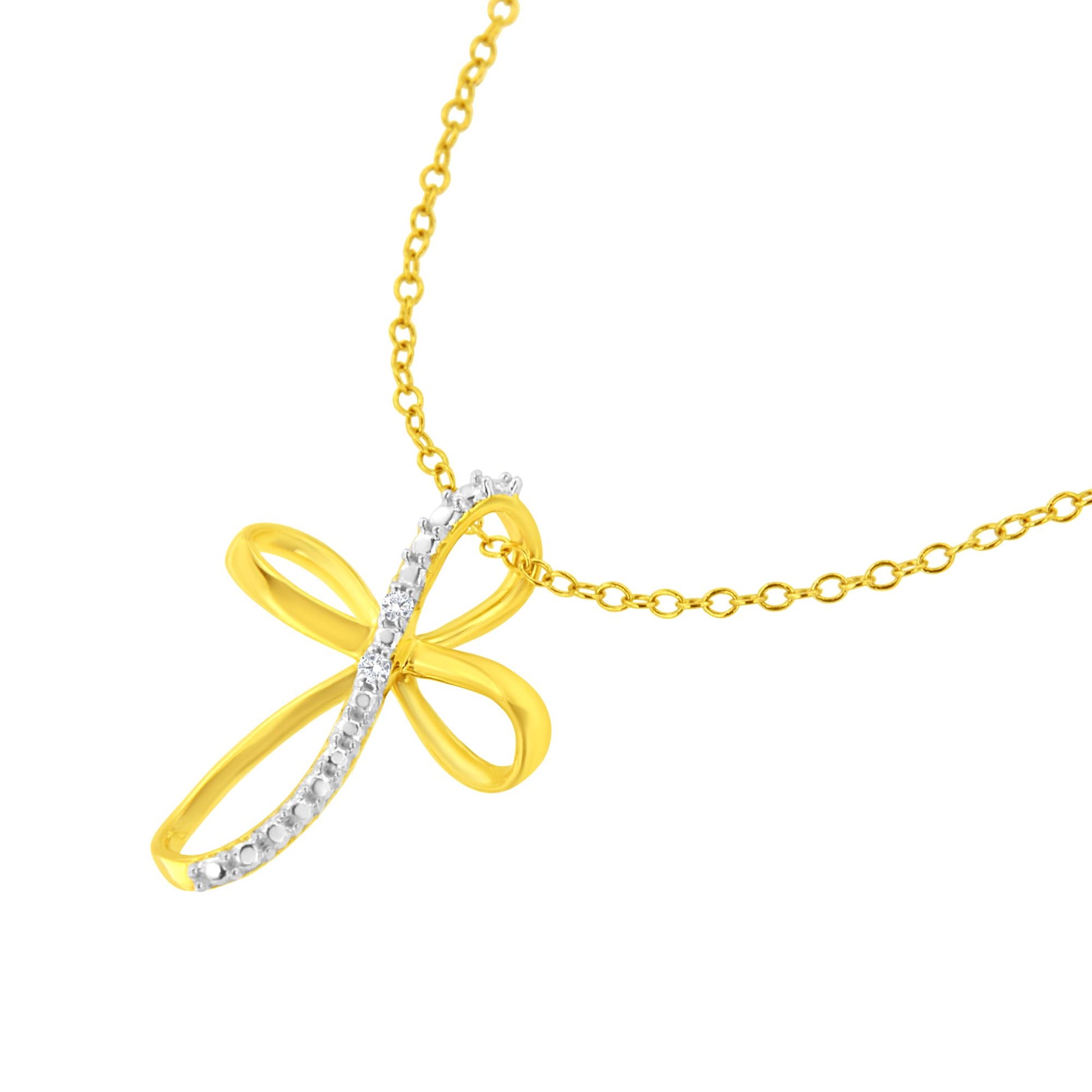 Yellow metal necklace with a looped infinity-shaped pendant accented with a curved line of small white gemstones, shown in close-up from a front angle.