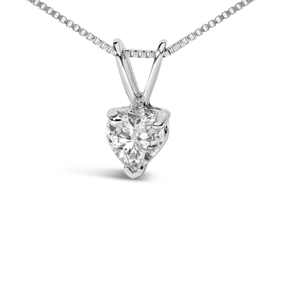 Close-up front view of a white metal necklace with a heart-shaped white gemstone pendant in a three-prong setting.