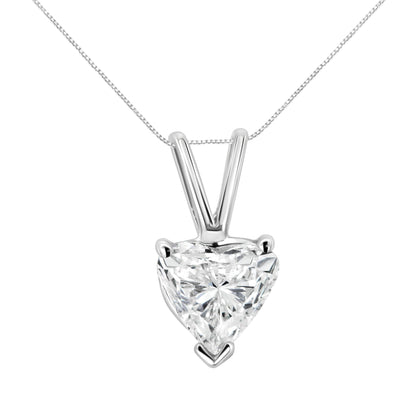 Front-facing close-up of a white metal necklace with a heart-shaped white gemstone pendant in a three-prong setting.