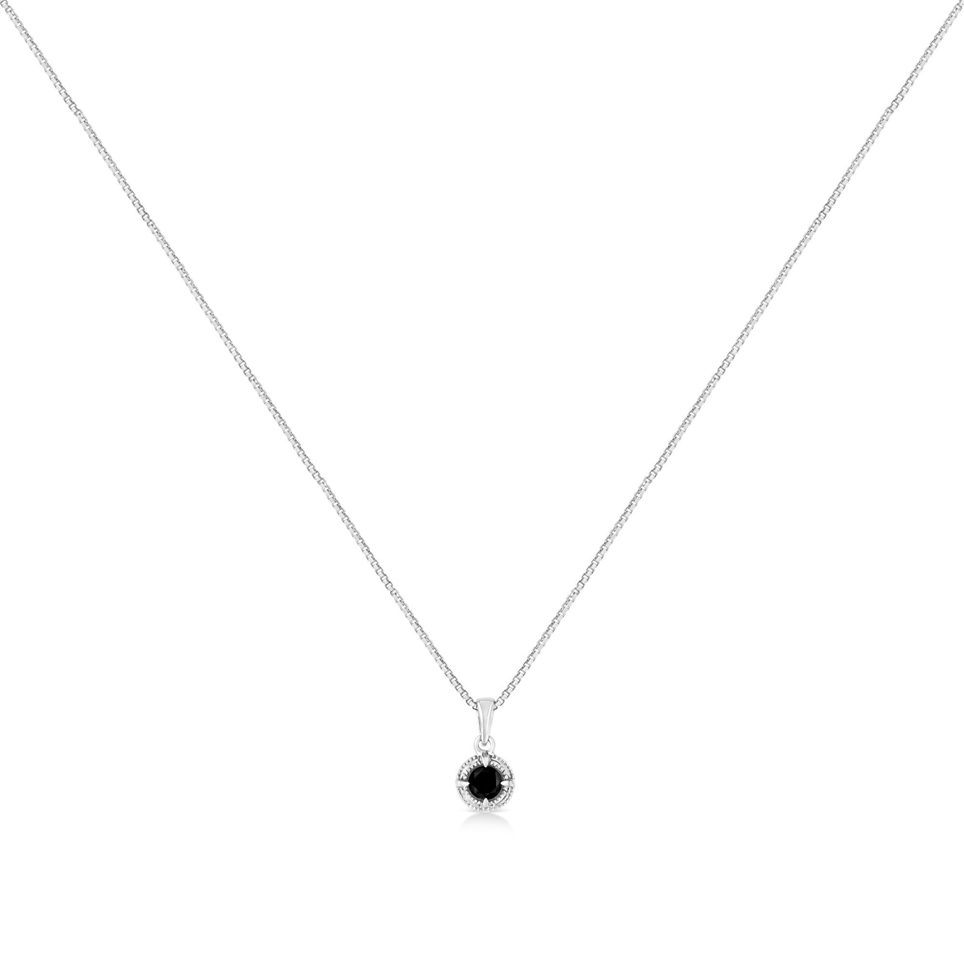 Front view of white necklace with a round black gemstone pendant in a four-prong setting.