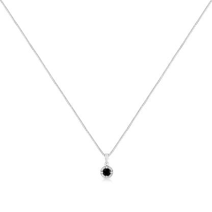 Front view of white necklace with a round black gemstone pendant in a four-prong setting.