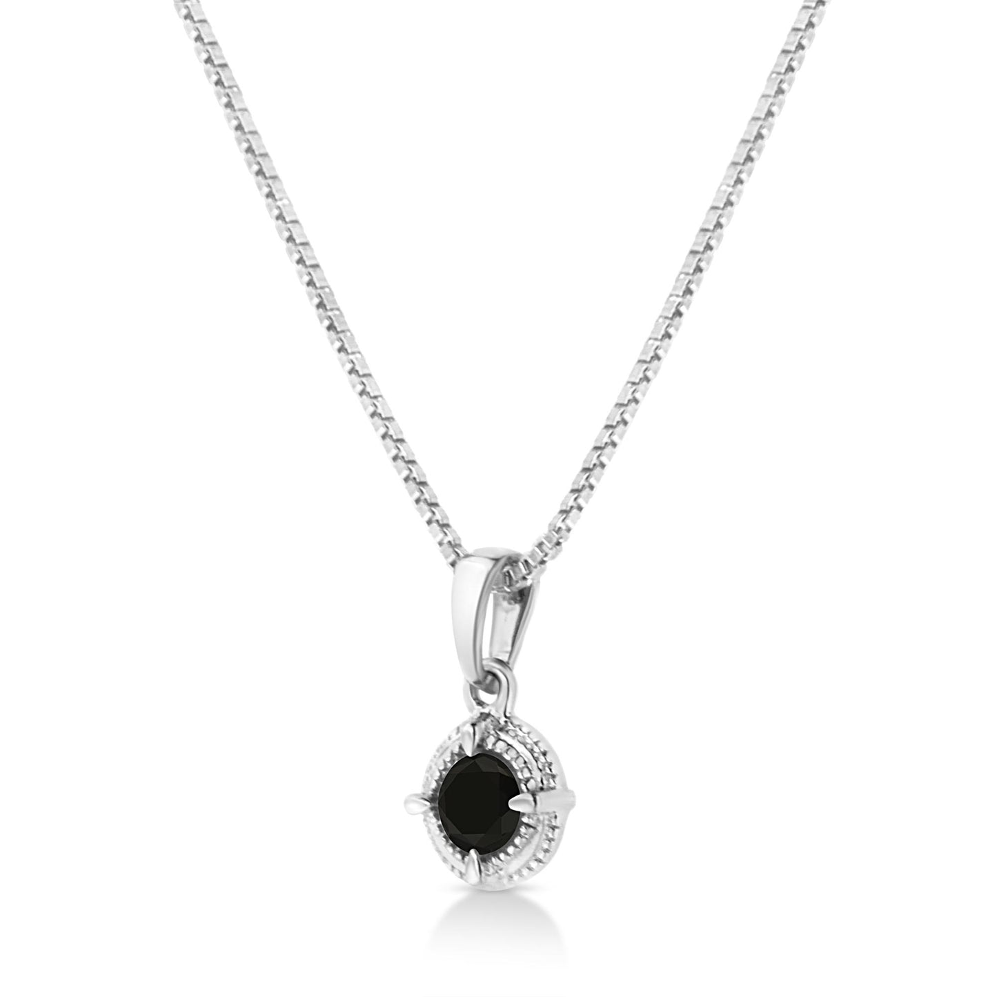 Close-up front view of white necklace with a pendant holding a round black gemstone in a four-prong setting.