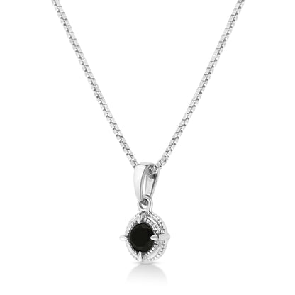 Close-up front view of white necklace with a pendant holding a round black gemstone in a four-prong setting.