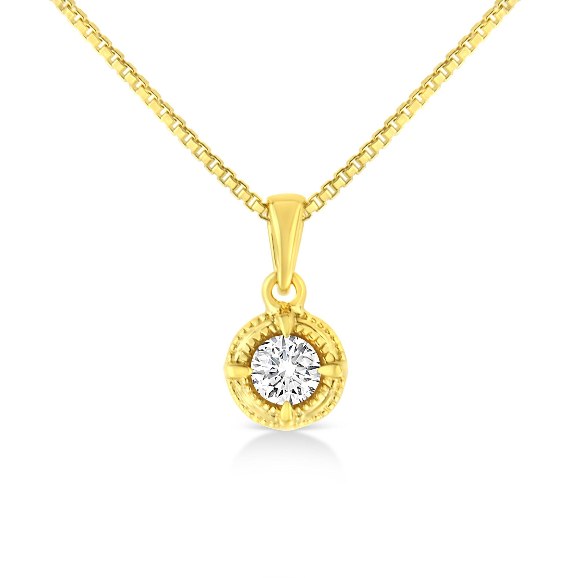 Front view of a yellow metal necklace with a round white gemstone in a four-prong setting pendant.