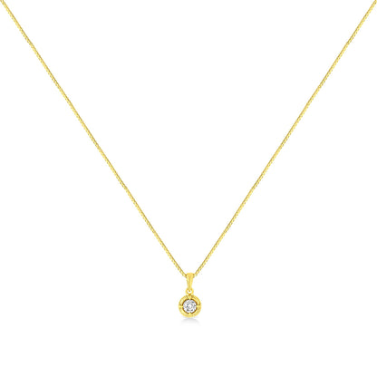 Yellow metal necklace with a small round pendant featuring a single brownish round gemstone in a four-prong setting, shown from the front.